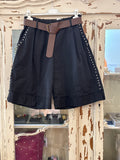 Bermudas negras Tachuelas