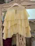 Blusa volantes amarilla