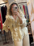 Blusa volantes beige