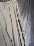 Pantalón flecos piedra