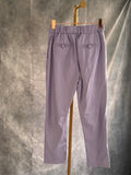Pantalón polipiel malva