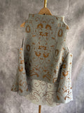 Chaleco gris bordados
