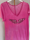 Camiseta asimétrica “Alas” rosa