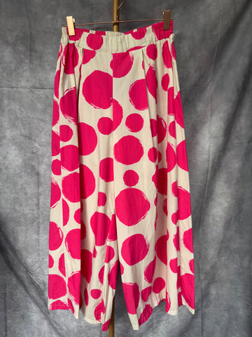 Pantalón  palazzo lunares fucsia