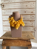 Collar pétalos amarillo