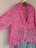 Blusa animal print fucsia