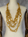 Collar largo eslabones caucho mostaza