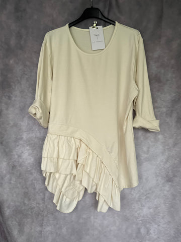 Camiseta volante crema