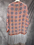 Kimono bordado con flecos