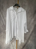Camisa blanca pliegues