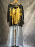 Jersey gris con dorado