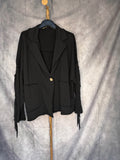 Chaqueta flecos negro