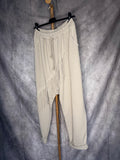 Pantalón baggy flecos claro