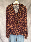 Camisa animal print volante