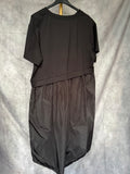 Vestido negro con flor