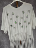 Camiseta flecos margaritas verdes