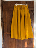 Pantalón palazzo cropped mostaza