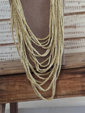 Collar tiras dorado