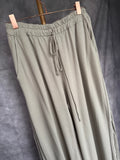 Pantalón flecos piedra